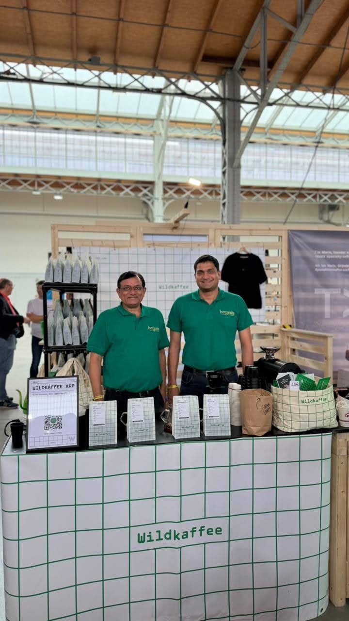 Mohan and Sunil Alvares in Hoysala shirts at the Wildkaffee stand